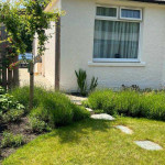Rustic stone path through garden in Angus