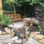 Stone retaining wall with integrated planting in Perth